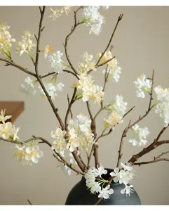 Detailed shot of artificial snowball flower branch, perfect home decor and table centerpiece.