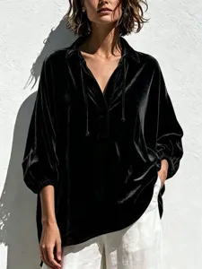Casual black velvet V-neck blouse featuring drawstring and stylish lantern sleeves for women.