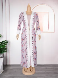 Detail view of floral print long cardigan dress set, elegant beachwear cover up outfit.