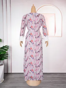 Long sleeve abstract print maxi dress with lace cuffs and belt for women beach vacation.