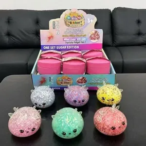 Conjunto de juguetes squishy con purpurina y astas de ciervo navideñas con caja expositora.