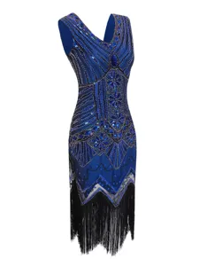 Detailed view of the vintage 1920s sequin beaded dress featuring a deep V-neck and fringe.