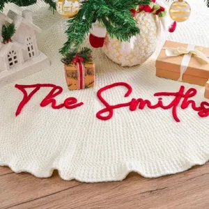 Falda para árbol de navidad bordada personalizada alfombra blanca tejida texto rojo
