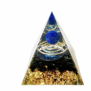 Crystal resin pyramid crystal stone energy ornament detail view showing inner blue sphere.