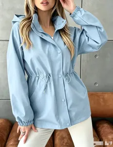 Women's waterproof hooded windbreaker jacket with drawstring waist for autumn casual wear.