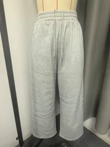 Grey fleece-lined wide leg sweatpants detail, elastic high waist casual winter trousers for women.