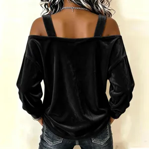 Back detail of the black velvet off-shoulder long sleeve top, showing the strap design and texture.