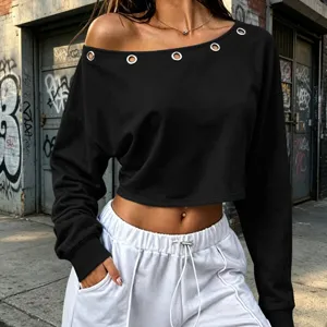 Stylish black off-shoulder long sleeve crop top featuring chic metal grommet neckline detail.