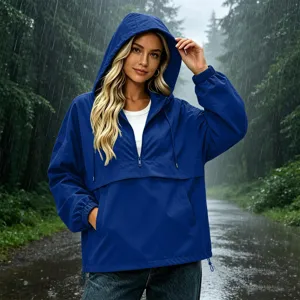 Blue waterproof hooded anorak jacket, casual long sleeve outdoor rain coat for women.
