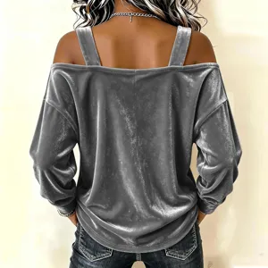 Detailed back view showcasing the grey velvet off-shoulder long sleeve top with chic straps.