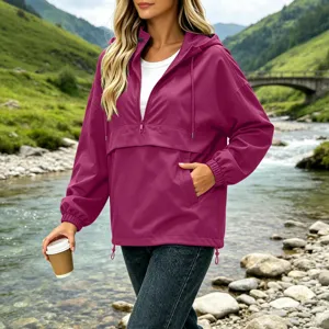 Outdoor waterproof half-zip windbreaker jacket detail view showing hood, zipper, and pocket.