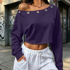 Detailed view of the dark purple off-shoulder long sleeve top with metal grommet eyelets.