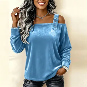 Blue velvet off-the-shoulder long sleeve top with shoulder strap and metal buckle detail.