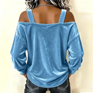 Detailed back view of women's light blue velvet cold shoulder long sleeve top with straps.