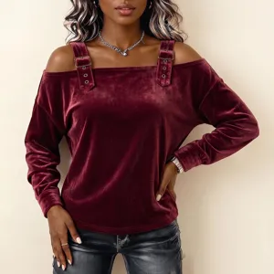 Elegant burgundy velvet off-shoulder long sleeve top featuring decorative buckles.