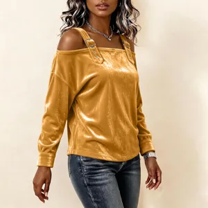 Women's chic off-the-shoulder velvet long sleeve top with decorative straps and buckles.