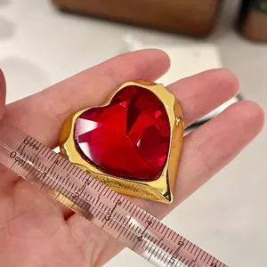 Vintage red crystal heart earrings retro gold tone metal love statement jewelry close up view