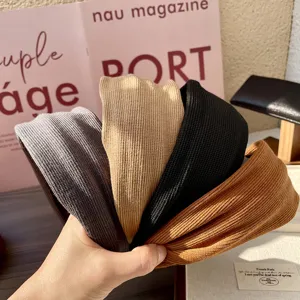 Knitted wide headband for women, stylish autumn and winter hair accessory for daily wear.
