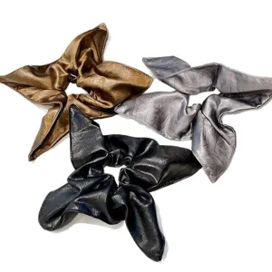 Coletero de cuero de alta calidad con puntas de tela, goma elástica para coleta de mujer.