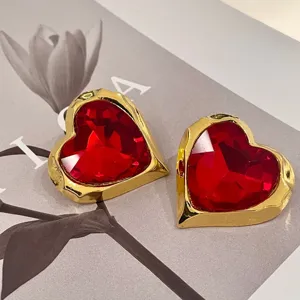 Vintage style red crystal heart earrings with chunky gold metallic irregular bezels for women.