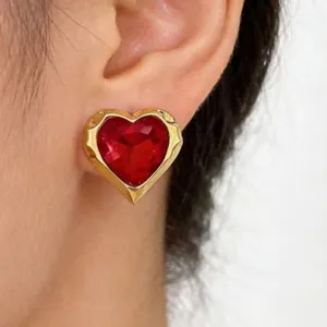 Vintage court style red crystal heart stud earrings for women, elegant gold tone metal jewelry.