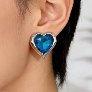 Vintage court style metal heart stud earrings featuring gorgeous blue crystal gems for women.