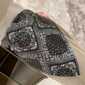 Black and white paisley irregular triangular scarf fashion skirt wrap silk-like layering accessory.