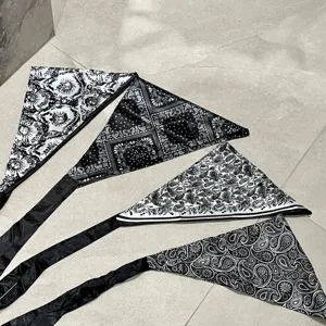 Black and white paisley irregular triangle scarf faux silk waist skirt layering accessory detail view.