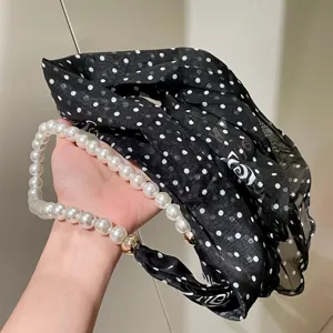 Black polka dot ribbon scarf with elegant pearl chain for women, chic French neck scarf.