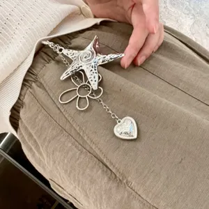 Silver star flower metal pendant y2k cool aesthetic bag charm keychain sweater chain accessory.