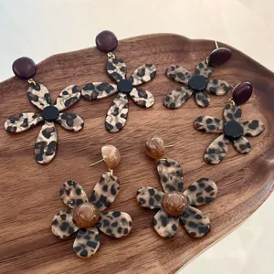 Leopard print acrylic flower earrings, trendy statement dangling ear jewelry for women.