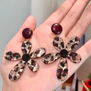 Leopard print flower earrings detail shot, showcasing the unique resin petal design and texture.