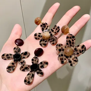 Leopard print flower earrings detail view, showcasing unique trendy resin design options for women.