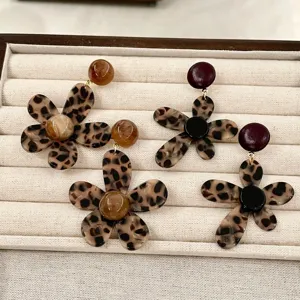 Leopard print flower earrings, acrylic statement floral ear studs for women, chic trendy jewelry.
