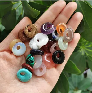Natural gemstone donut beads pendant charms, polished crystal agate DIY jewelry accessories detail.