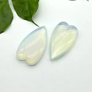 Detail view of large heart-shaped crystal opalite pendant DIY jewelry making component.