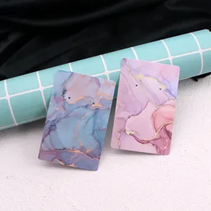 Wholesale 400g coated paper jewelry display cards for earrings and necklaces with marble art.