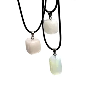 Natural crystal gemstone irregular pendant necklace detail view showcasing unique small square stone.