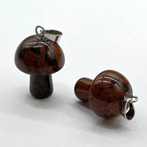 Detail shot of 2cm natural stone mushroom pendant showing exquisite carving and polished texture.