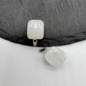 White crystal stone pendant detail, natural irregular stone block necklace accessory.