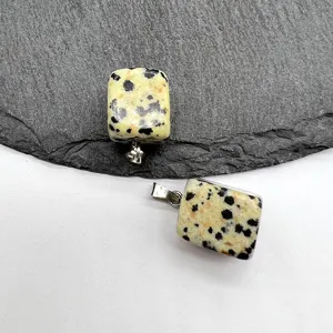 Natural stone square pendant detail view, showing unique spotted texture and metal bail.