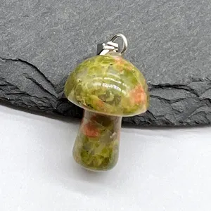 Mini natural stone mushroom pendant jewelry detail view, exquisite crystal carving accessory.