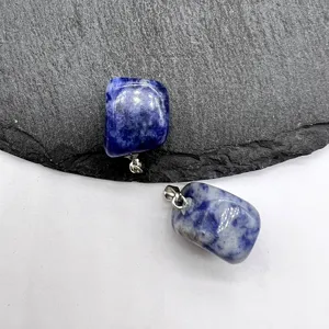 Blue natural stone crystal irregular pendant close-up detail showcasing unique texture and metal bail.