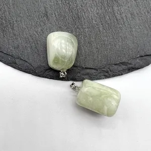 Detailed view of natural green crystal irregular square pendant necklace jewelry.