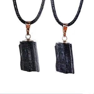 Natural black tourmaline raw stone pendant necklace with black braided leather cord jewelry.