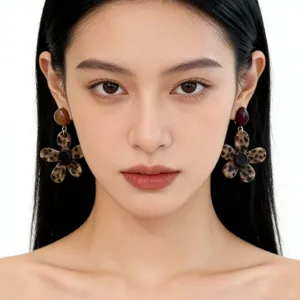 Leopard print flower earrings for women, unique statement design, chic and trendy resin jewelry.