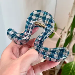 Blue plaid hair claw clip, chic minimalist design, stylish resin shark hair accessory for daily wear.