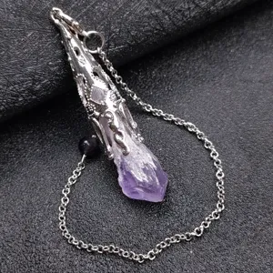 Natural amethyst crystal pendulum pendant necklace with raw stone and silver tone metal cage.