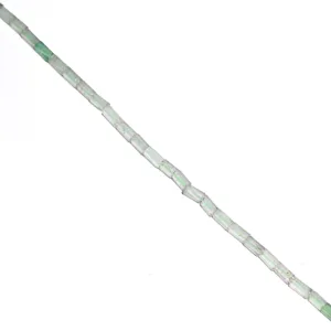 Close-up detail shot of translucent green tube loose beads for DIY jewelry making accessories.