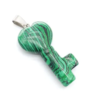 Close-up detail of green striped stone heart key pendant with metal bail, elegant jewelry design.